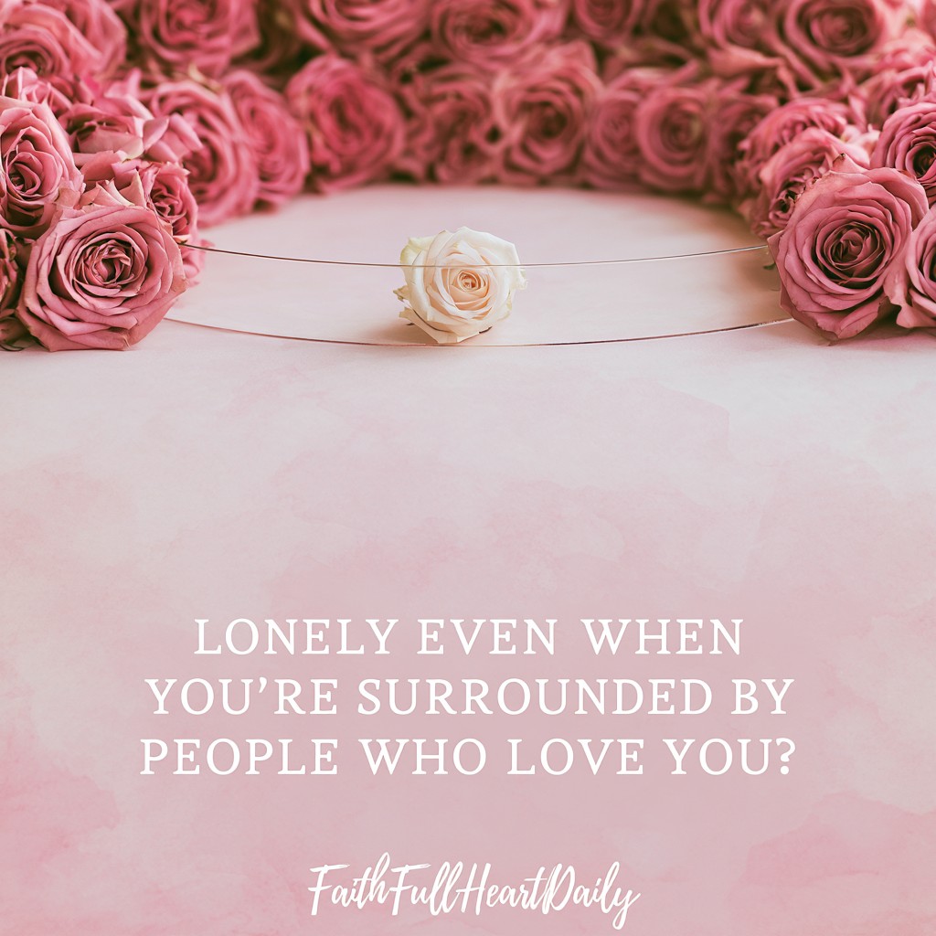 A soft, blush pink floral arch framing a cream-toned graphic with readable text that says Lonely Even When You're Surrounded By People Who Love You?